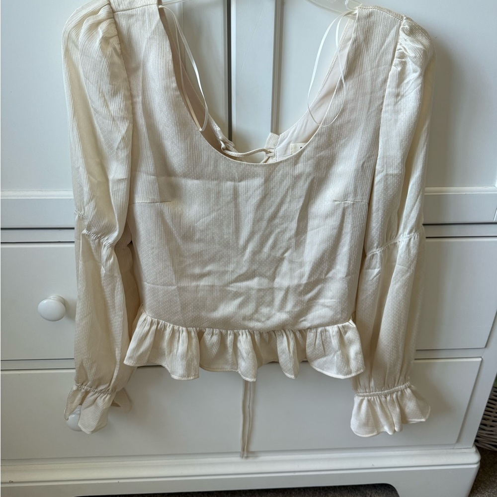 Promesa Cream Ruffled Peplum Blouse